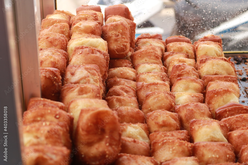 Bolang-baling is fried bread made from wheat flour with good taste, generally sold on the side of the road.