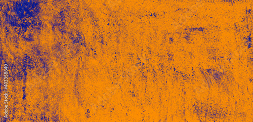 orange washed hand-painted illustration texture design of old distressed vintage grunge concrete with blue stains. damaged textured abstract speckled cement backdrop as web banner background.