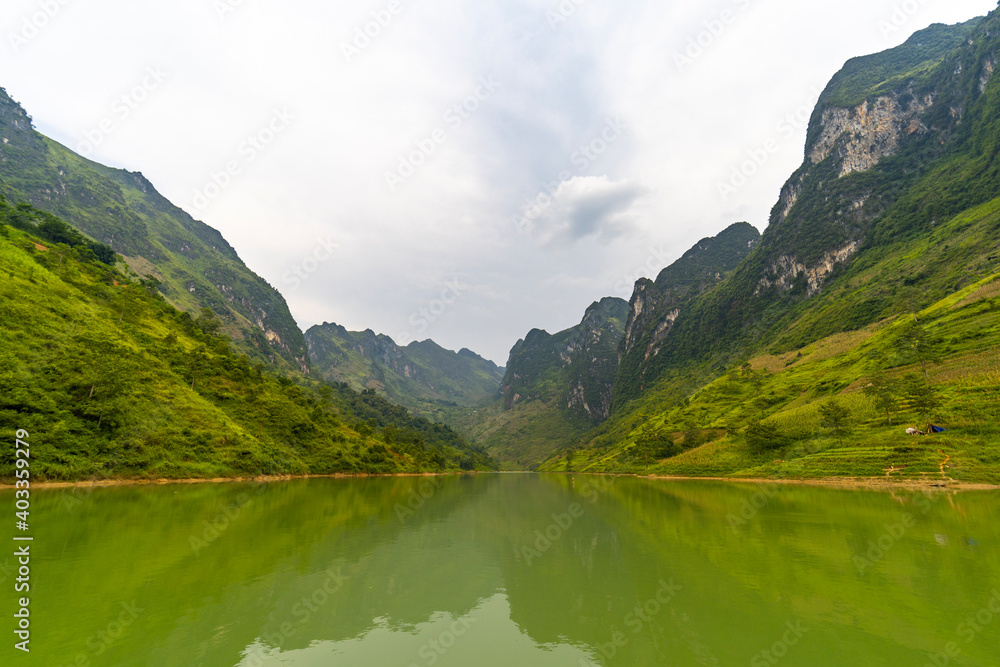 Scenic boat cruise on Nho Que River. Ha Giang, Vietnam.