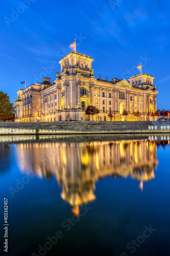 The Reichstag at the river Spree in Berlin at dawn