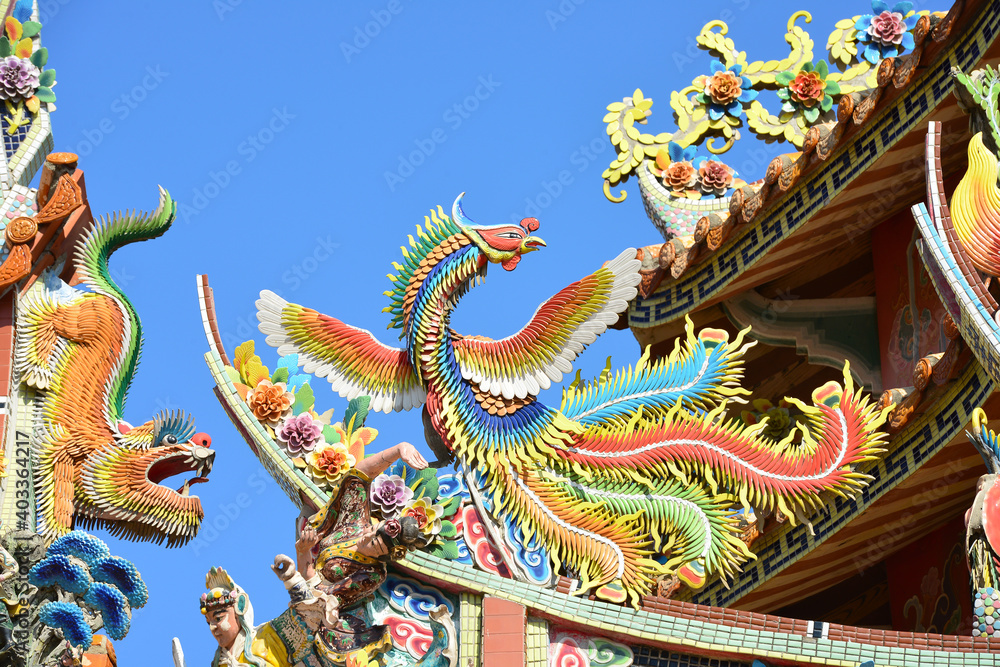 Traditional Chinese Ceramic bird sculpture on temple roof