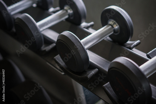 dumbbells in the gym at sports club for exercise and Bodybuilding