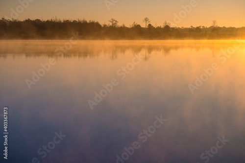 Sunrise over the river with foggy at Wang Kwang Reservoir Phu Kradueng National Park, Loei, Thailand