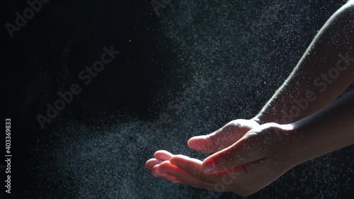 Slow motion Closeup father hand spraying alcohol for kid for cleaning, Covid19 disinfection concept