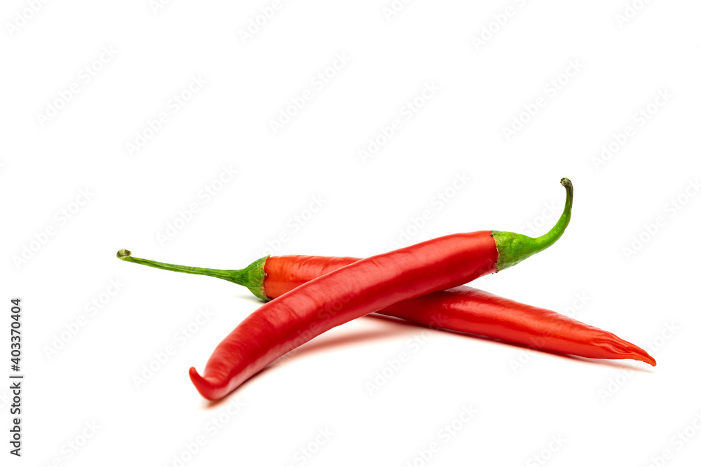 Chilli. Two red chili peppers isolated on white background. Chilli. Two red chili peppers isolated on white background.