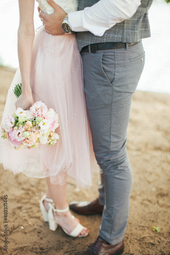Wedding bouquet. A bouquet of roses. The girl holds a bouquet. Bride with a bouquet. Romance. Wedding. Wedding bouquet. A bouquet of roses. The girl holds a bouquet. Bride with a bouquet. Romance. Wedding.