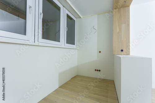 empty loggia with white wall without furniture