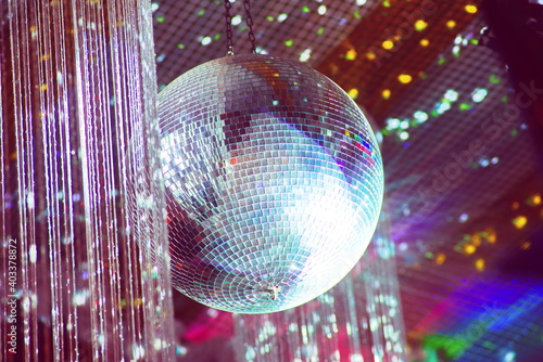 Obraz na plátně disco ball with colour lights 70s