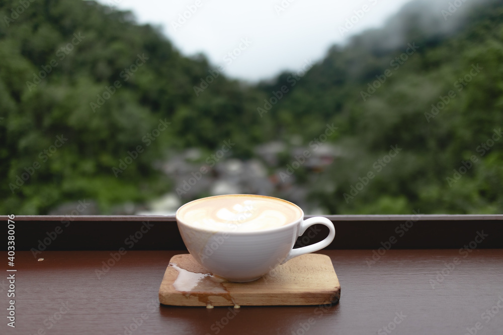 Coffee cup at small village in deep valley in Mae Kampong, Chiangmai, Thailand.