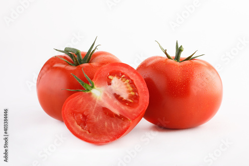 Two red tomatoes in a cut