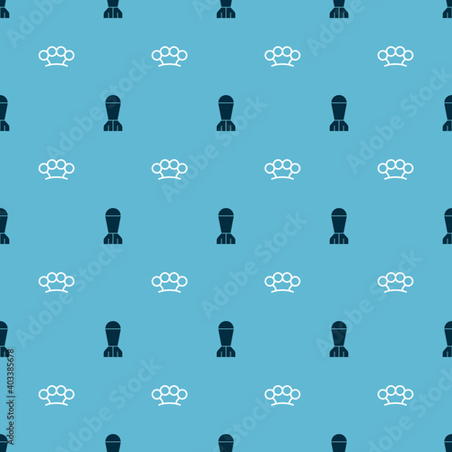 Set Aviation bomb and Brass knuckles on seamless pattern. Vector.