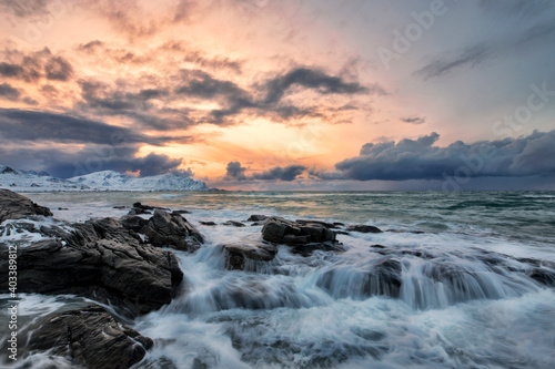 Beautiful landscape. Sea stones on a sunset background. © yulia.shalyapina