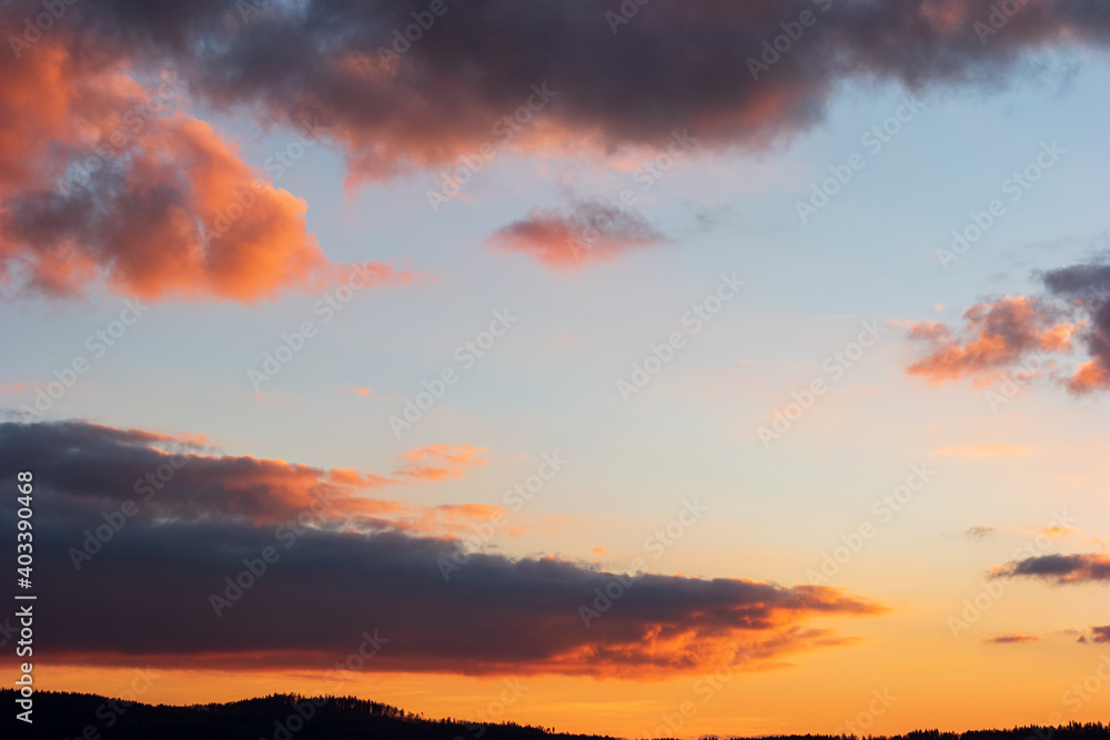 Dramatic blue sky during sunset blue pink and dark violet clouds