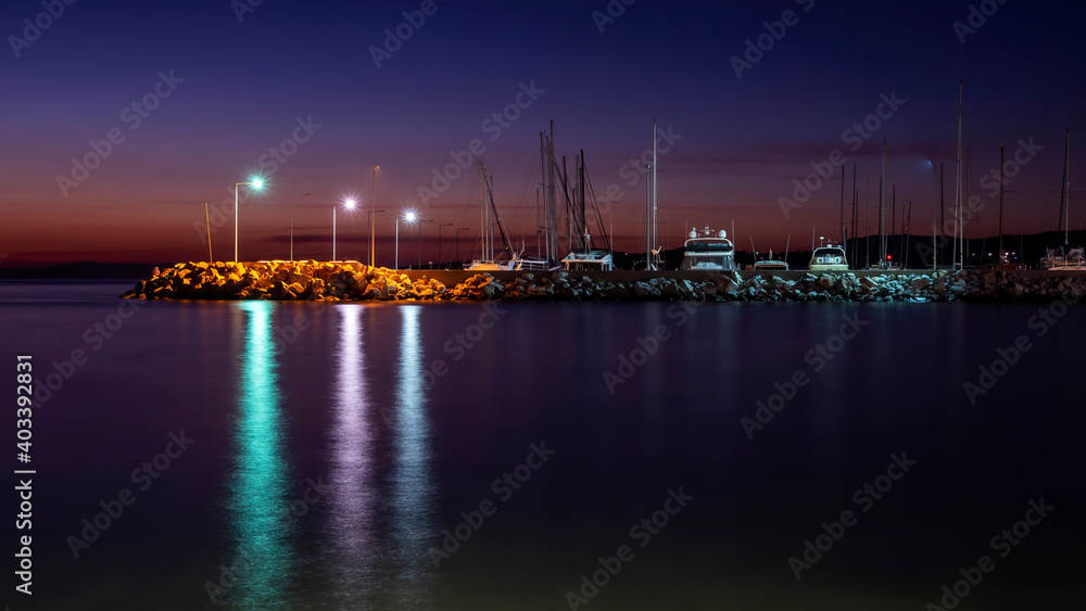 Sea port at night in Greece