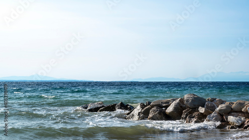 Rocks on the Aegean sea coast in Greece © frimufilms
