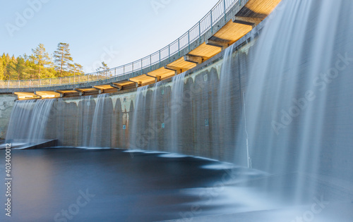 Water dam in Norway with waterfall  photo
