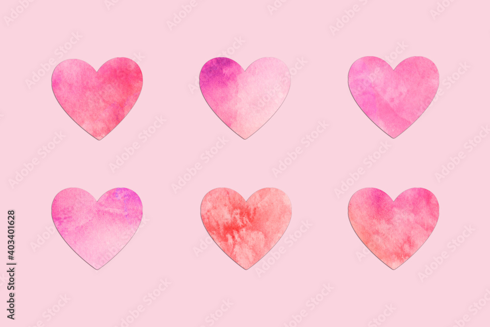 Paper hearts aligned on pink background, minimal valentines day card
