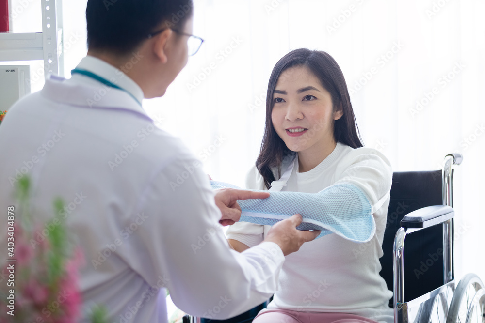 Fototapeta premium woman patient listening doctor explain treatment painful symptoms arm, health care concept.