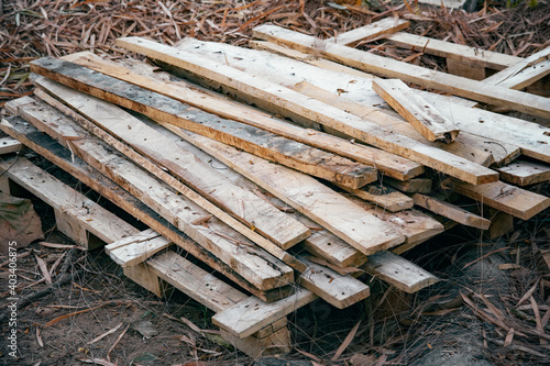 Fototapeta Naklejka Na Ścianę i Meble -  Reclaimed pallet wood boards on ground.  Pallet Wall timber.
