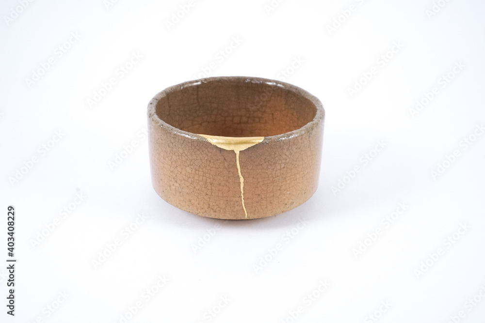 Antique Kintsugi Japanese beige sake cup, , Gold cracks Kintsugi, Kintsukuroi Japanese technique.
Antique Kintsugi Japanese beige sake cup, , Gold cracks Kintsugi, Kintsukuroi Japanese technique.