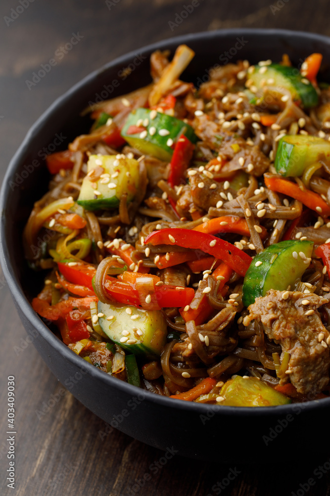 Noodles with vegetables and meat close up Noodles with vegetables and meat close up