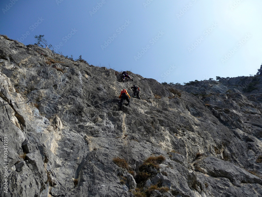 Climber at Kaiser Max via ferrata in Tyrol, Austria