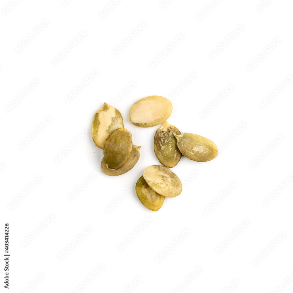 Pumpkin seeds pile isolated on white background top view Pumpkin seeds pile isolated on white background top view