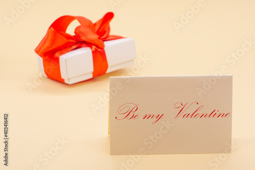 craft gift box with red satin ribbon. happy valentine's day © Alena