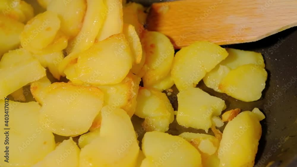 close up of a potato in a pan close up of a potato in a pan