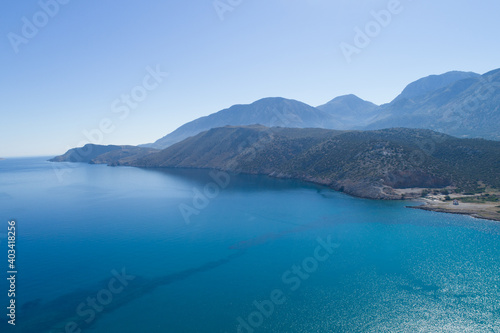 Beautiful landscape of the island from a bird s-eye view. Blue sky and sea  mountains.