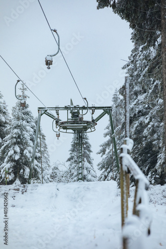 defective ski lift. Ski lift in the forest 