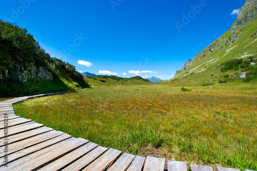 landscape with wooden bridge (Wiegensee, Vorarlberg, Austria)