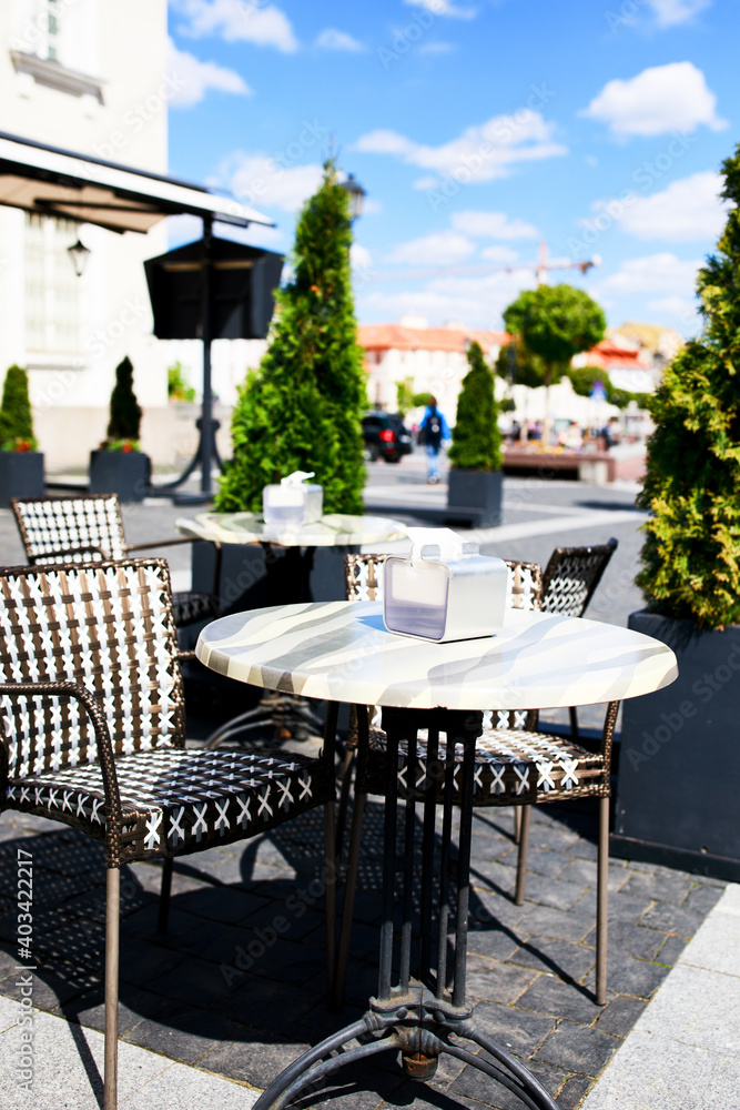 Fototapeta premium Table in a street cafe close-up.