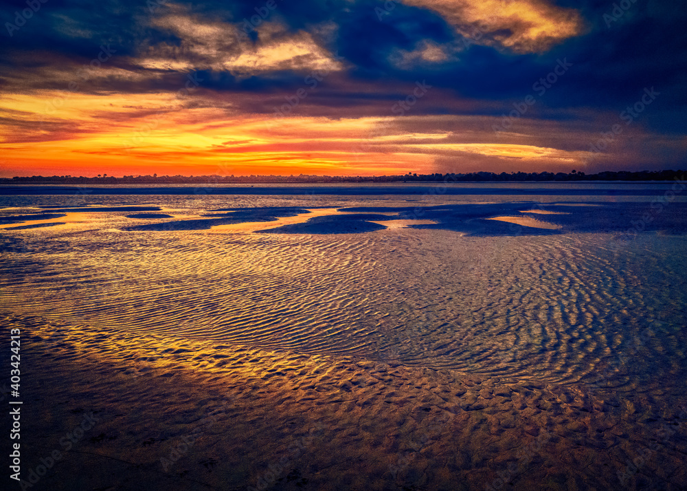 Sunsetting at low tide at Matanzas Inlet in St. Augustine, Florida.