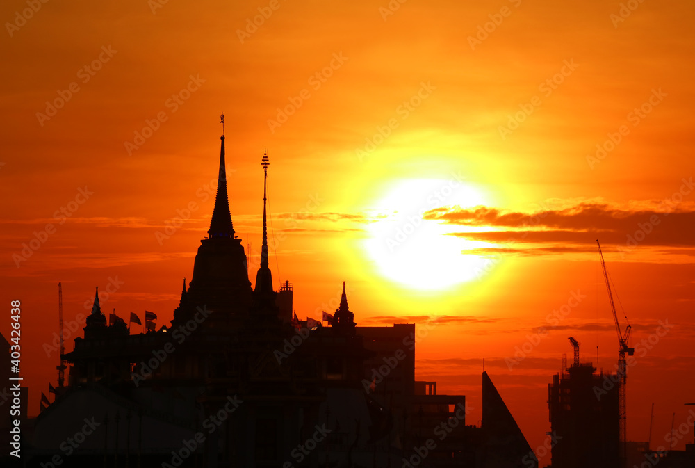 Silhouette of the Chedi Phu Khao Thong (Golden Mount) of Wat Saket Temple at Dawn, the Iconic Landmark of Bangkok, Thailand
