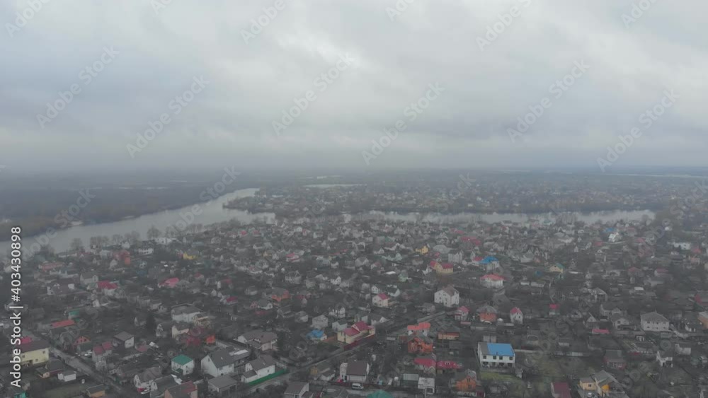 Private houses by the river winter aerial drone Private houses by the river winter aerial drone