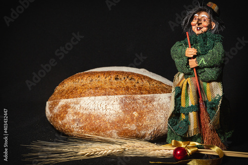 woman befana with a of bread