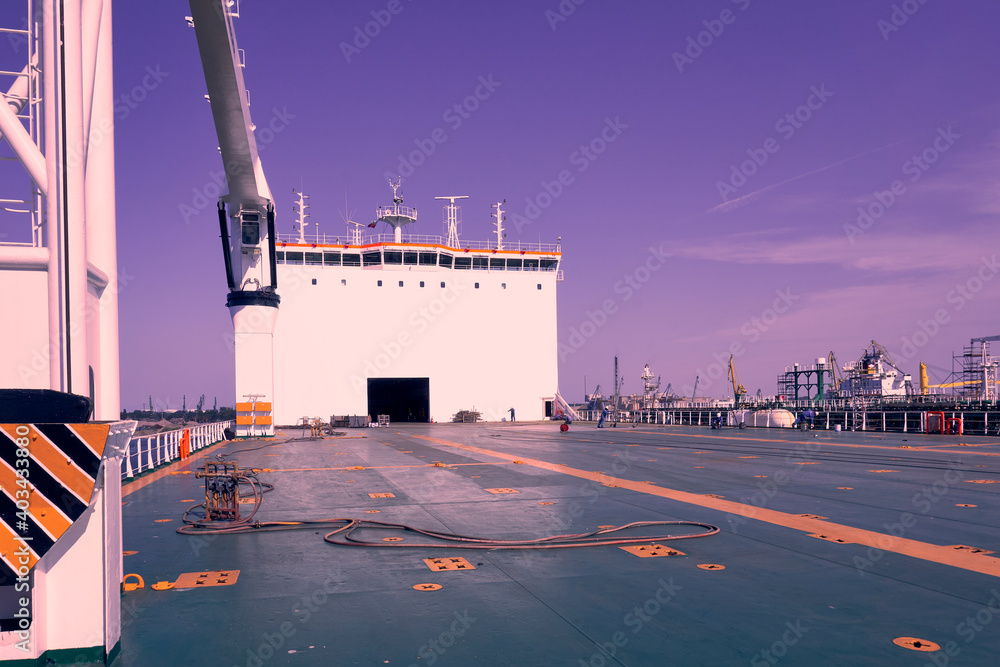 Fototapeta premium big yellow roro vessel inside a dry dock for repair