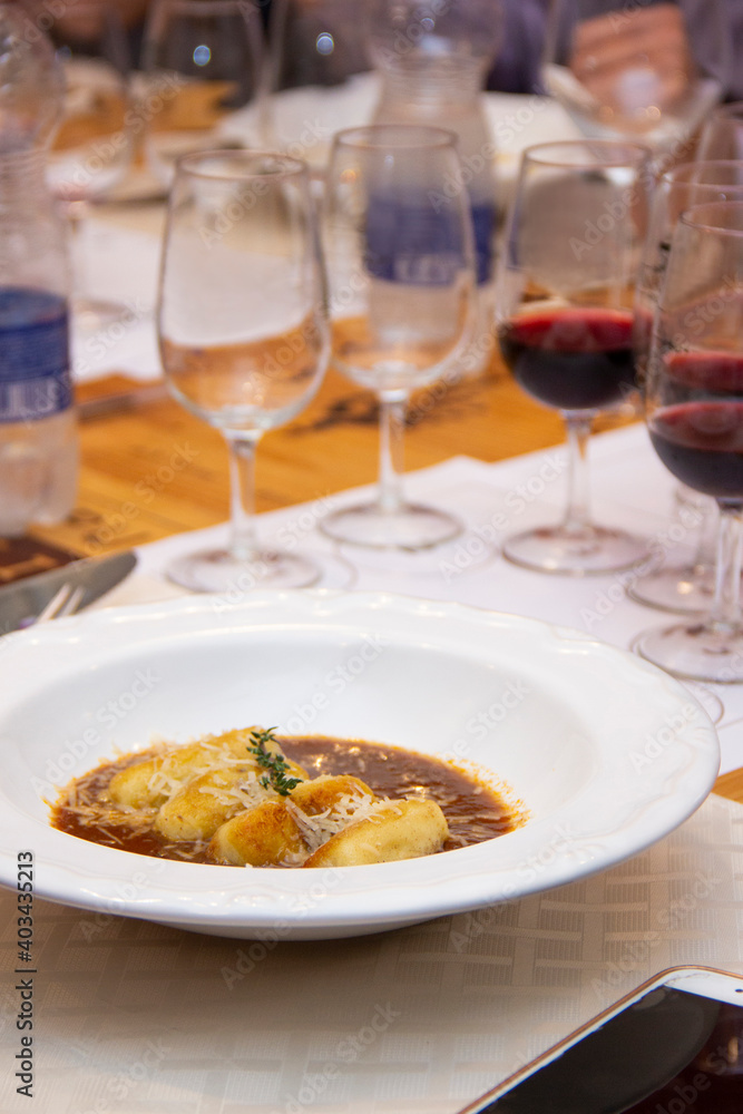 Gnocchi stuffed with ossobuco, ossobuco broth and grana padano cheese Gnocchi stuffed with ossobuco, ossobuco broth and grana padano cheese