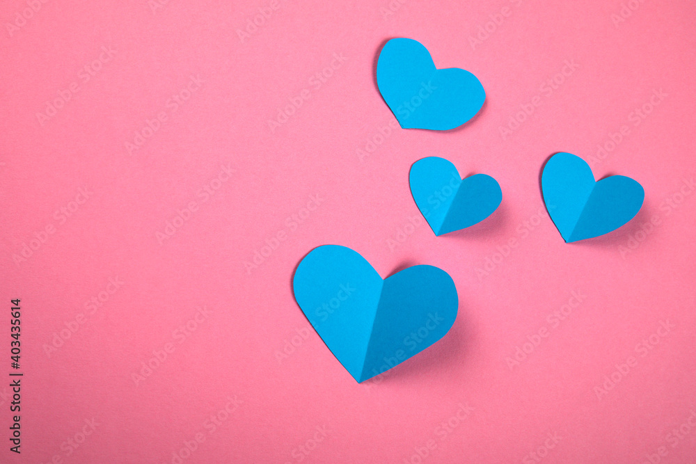  Blue hearts, symbolizing a boy or a man. Falling in love and relationships concep