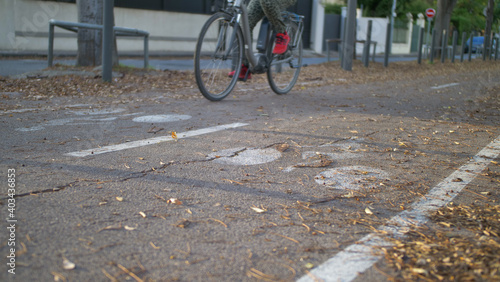 Colorful and sunny bicycle lane with a bike symbol in autumn with a cycle in mouvement - Cycle path in Marseille, France, European City