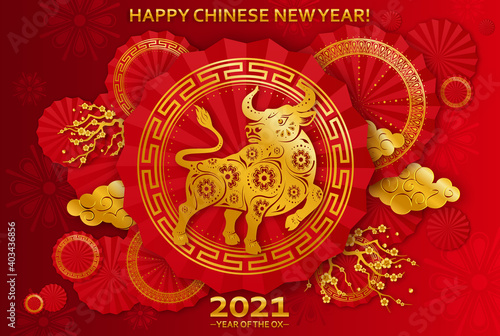 Chinese new year 2021 year of the ox , red and gold paper cut ox character. Chinese characters mean Happy New Year, Ox, Good Luck.