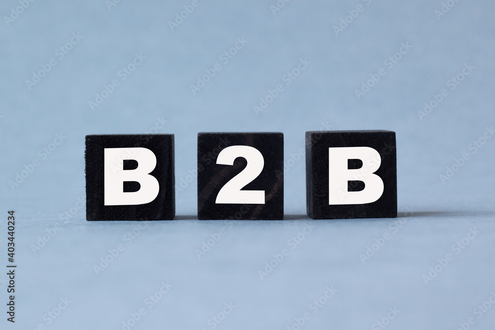 B2B. The text is on the dark and light cubes. Bright solution for business, financial, marketing concept B2B. The text is on the dark and light cubes. Bright solution for business, financial, marketing concept