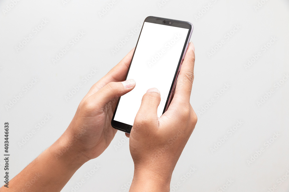 Man holding mobile phone with blank screen on white background. Man holding mobile phone with blank screen on white background.