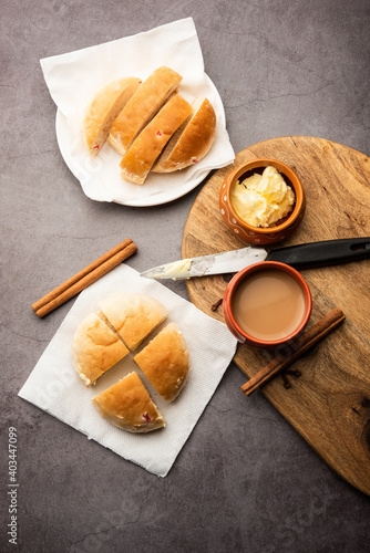 Bun Maska Masala chai is a popular food in Mumbai, India which is popular in Irani Cafe photo