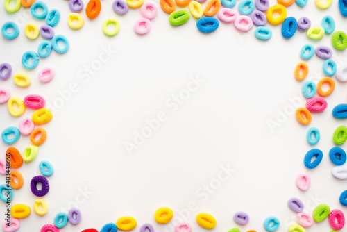 colored elastic bands for hair on a white background