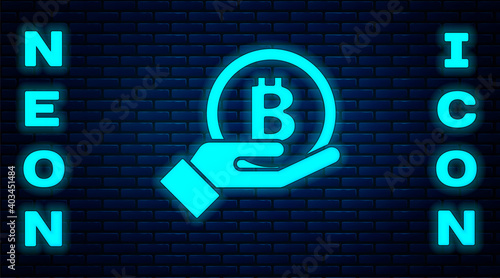 Glowing neon Hand holding Bitcoin icon isolated on brick wall background. Blockchain technology, digital money market, cryptocoin wallet. Vector.