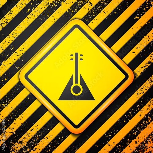 Black Musical instrument balalaika icon isolated on yellow background. Warning sign. Vector.