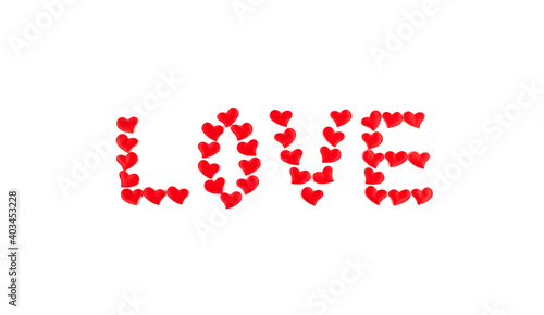 Greeting card for Valentine's Day. The word Love is made of red hearts on a white background.