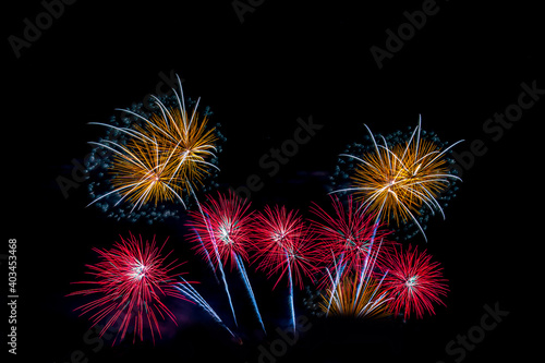 celebration happy new year and merry christmas firework isolated on black isolated background